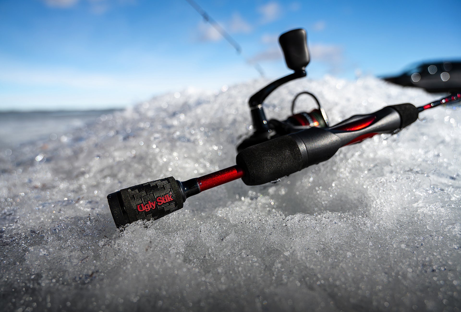 Fishing rod on ice with a blurred background